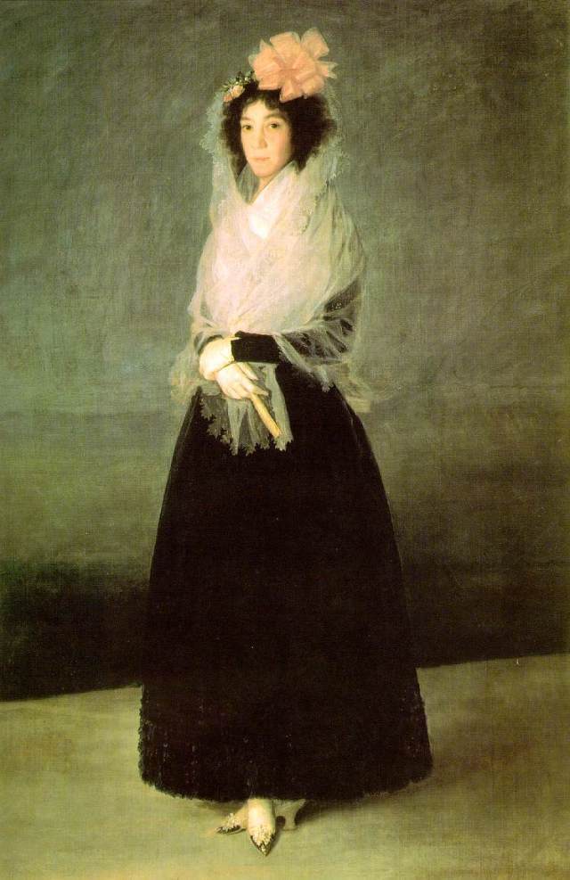Francisco de Goya. Retrato de la marquesa de La Solana. 1794-1795. Museo del Louvre. París. La mantilla es de muselina blanca con cerco de festón en zigzag, cae sobre los hombros y se recoge en forma de chal. La cabeza se adorna con una gran moña de color rosa. 