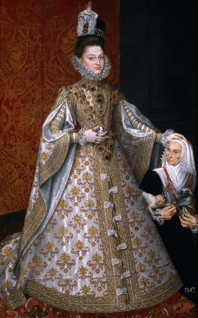 Alonso Sánchez Coello. La Isabel Clara Eugenia y Magdalena Ruiz. Hacia 1585-1588. Museo del Prado. La infanta lleva una riquísima saya entera con cuerpo cuajado de joyas y mangas en punta. Porta en su mano derecha un camafeo con la efigie de su padre, Felipe II.