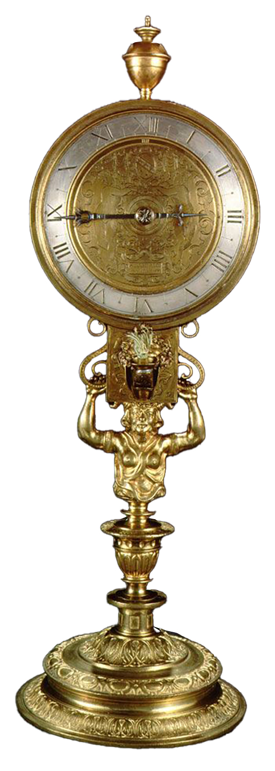 Hans de Evalo. El Candil. 1583. Patrimonio Nacional. Madrid. Se trata de un reloj denominado “de custodia. Este reloj era un reloj nocturno pues el Rey estaba muy interesado en controlar el tiempo de día y de noche. Por este motivo, colocó este reloj cerca de su cama y de esta manera conocía en todo momento la hora, podía trabajar en sus aposentos y asistir a las oraciones con la comunidad religiosa que vivía en monasterio de El Escorial.
